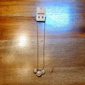 Matching necklace and earrings.